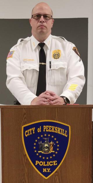 Chief Leo Dylewski standing at a podium
